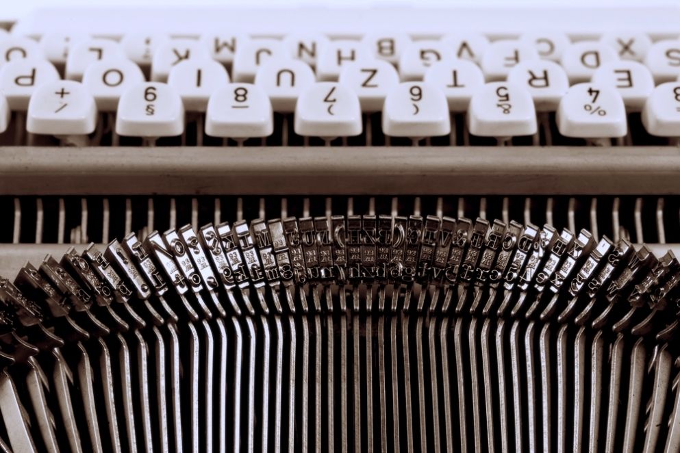 An old typewriter, close-up, mechanical details.