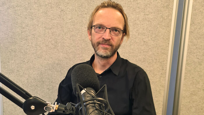 Thomas Schubert in the podcast studio. 