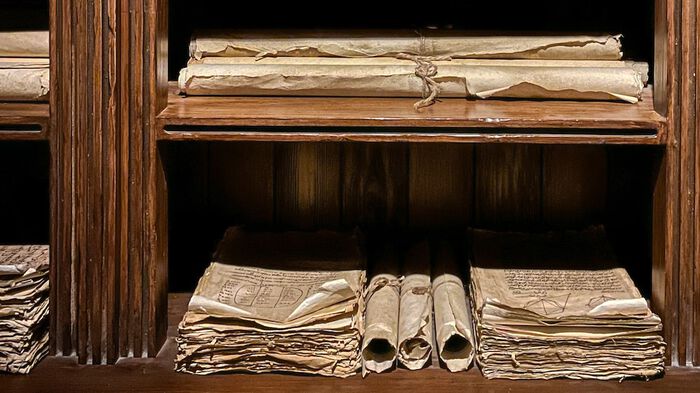 An archive of old scrolls or manuscripts. 