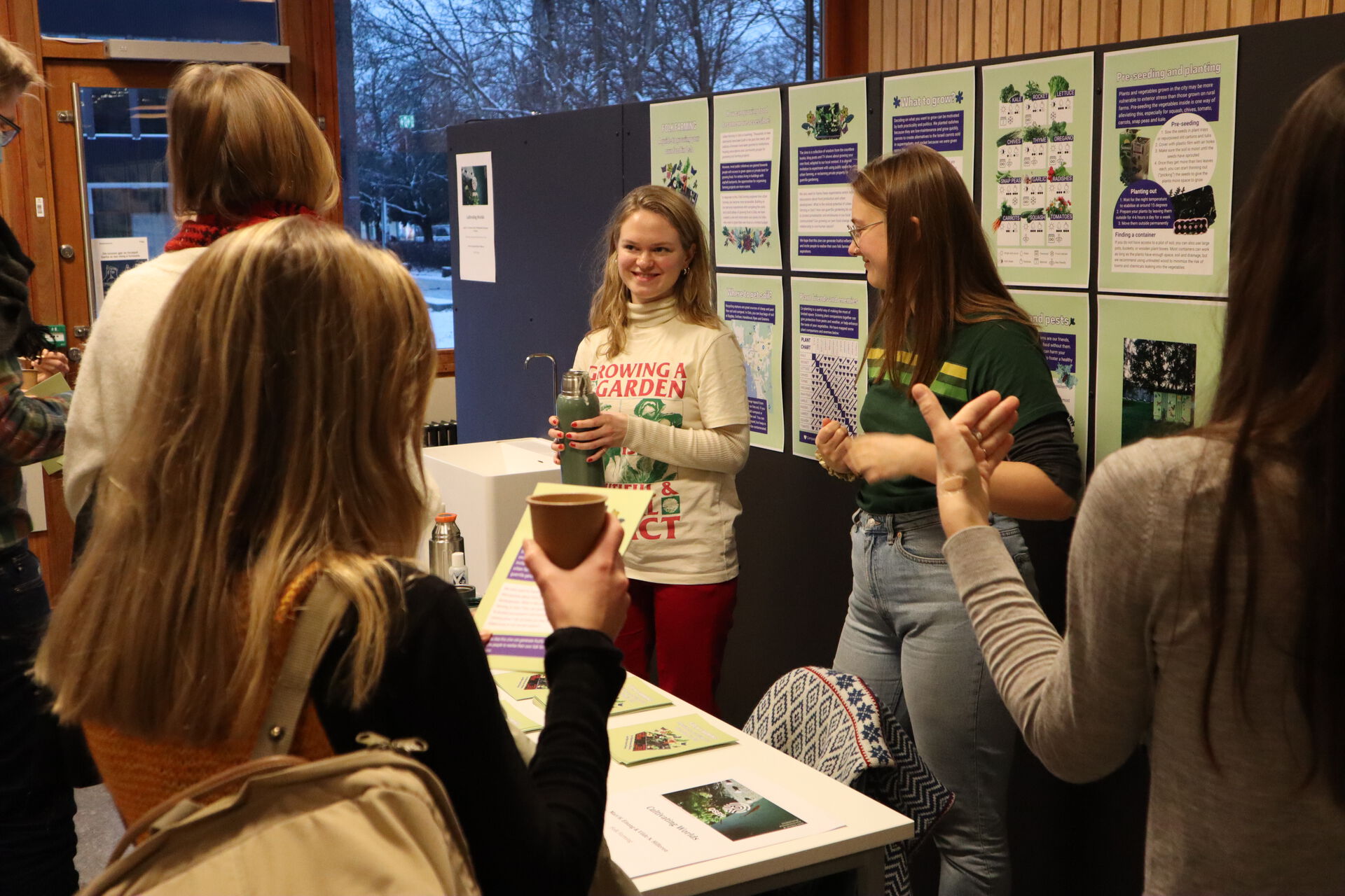 Photo of students at the ECOSLAM exhibition