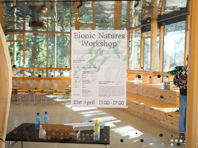 Poster for the Bionic Natures workshop a glass door. Wooden furniture is seen inside the room. 