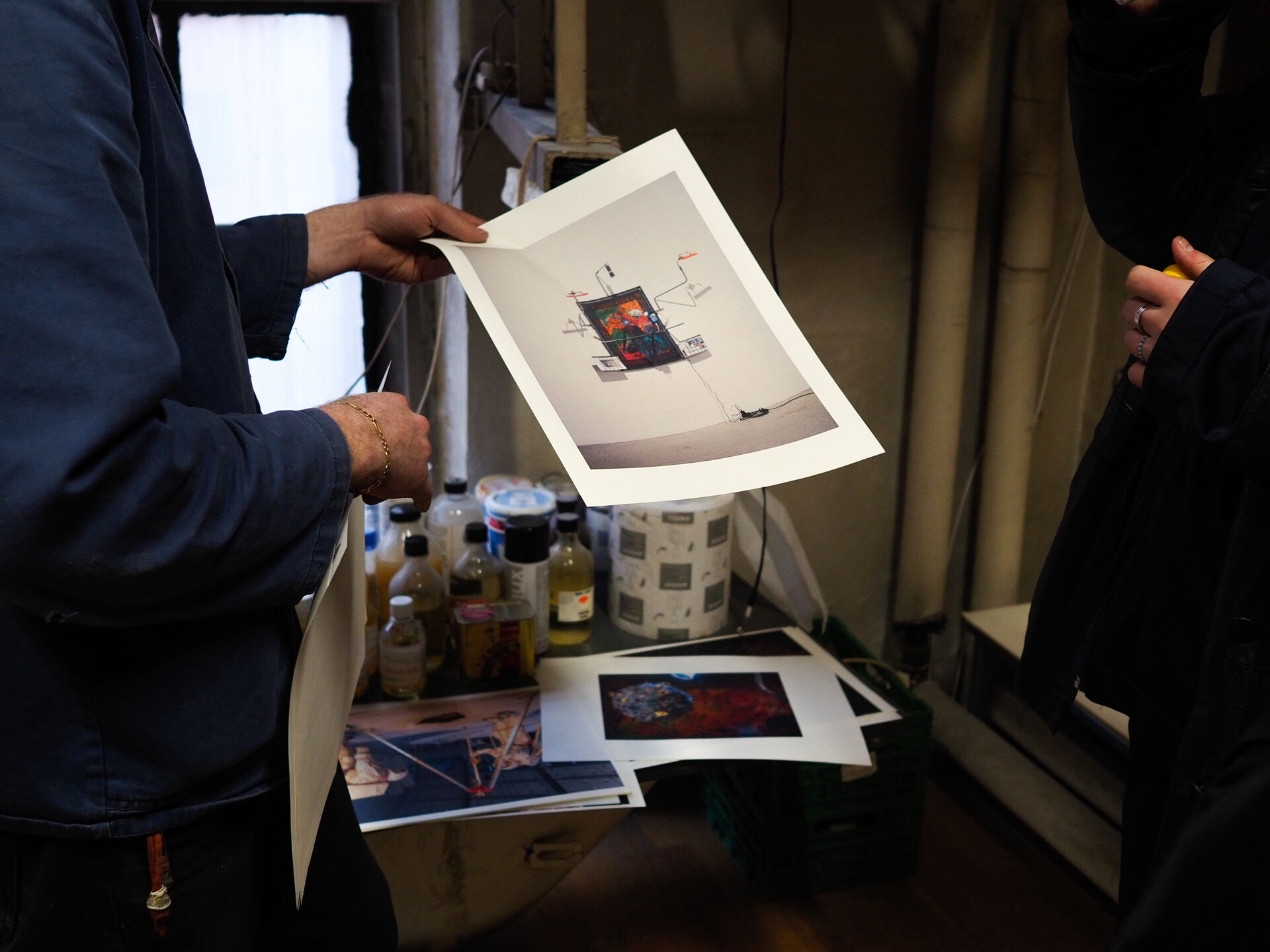 Person holding a printed image