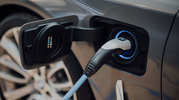 Charging an electric car.