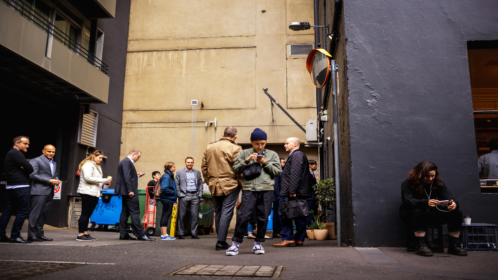 Image illustrating a busy urban landscape with people