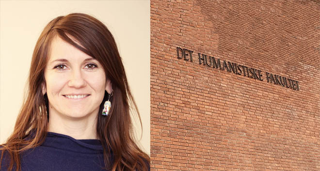 Doctoral candidate Anastasia Kriachko Roeren, wall with text "Det humanistiske fakultet"