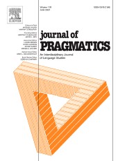Cover of Journal of Pragmatics, black writing on white background with a triangular orange figure